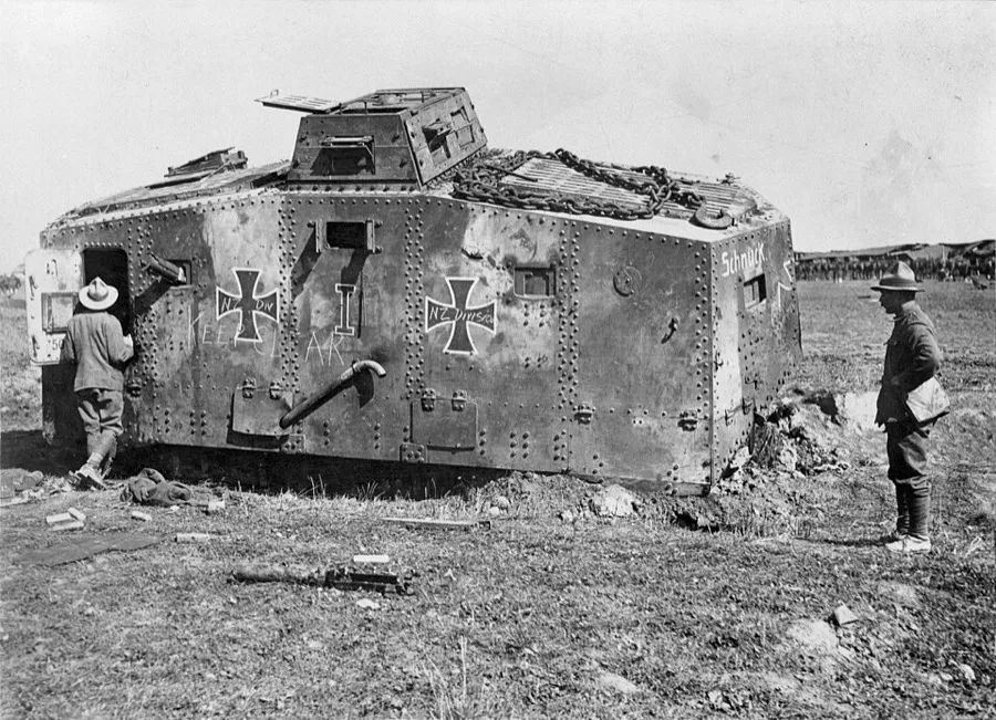 New Zealand soldiers examining a German tank nicknamed "Schnuck", captured by New Zealand forces on the Western Front.