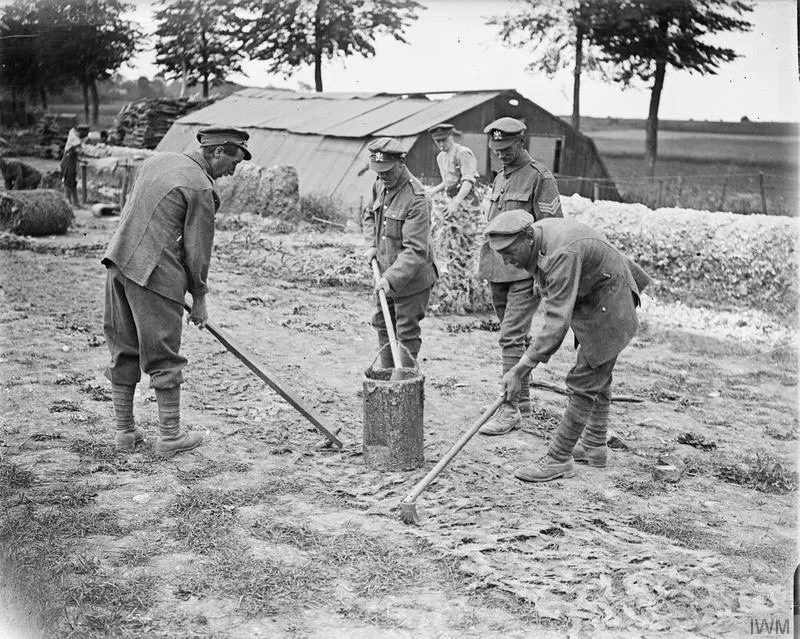 Camouflage Techniques on the Western Front, 1914-1918 Painting camouflage netting the required colour at Basseux, 16th June 1918.
