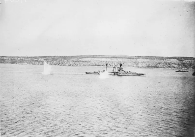 The battleship HMS Queen Elizabeth being bombarded by Turkish shells off Cape Helles.