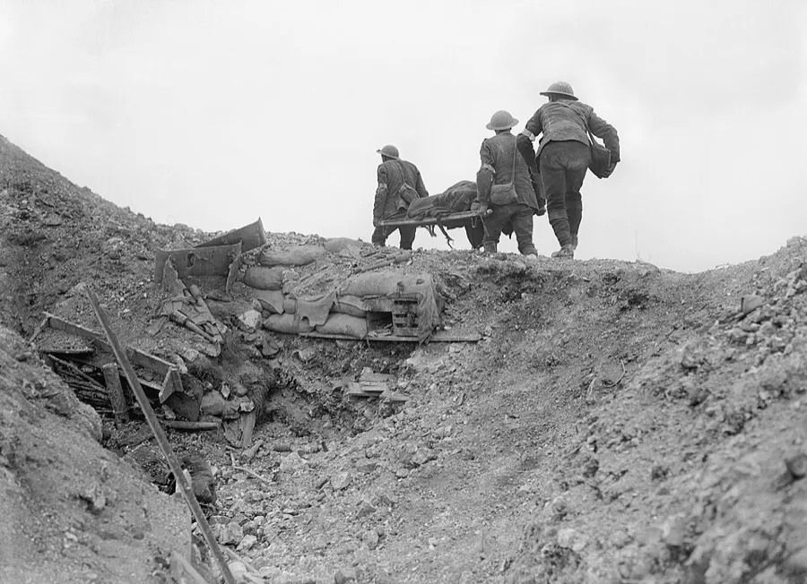 British stretcher bearers recovering a wounded soldier from a captured German trench during the Battle of Thiepval Ridge , late September 19