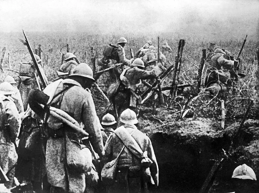 French soldiers moving into attack from their trench during the Battle of Verdun, 1916.