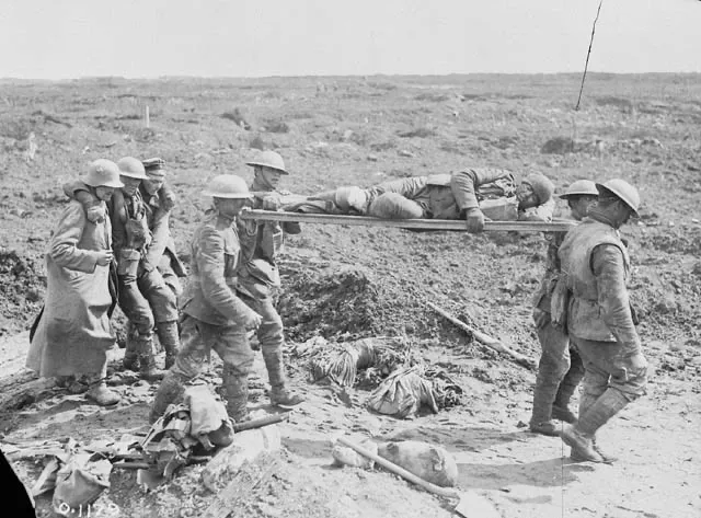 Stretcher bearers and German prisoners bringing in wounded at Vimy Ridge, during the Battle of Vimy Ridge.