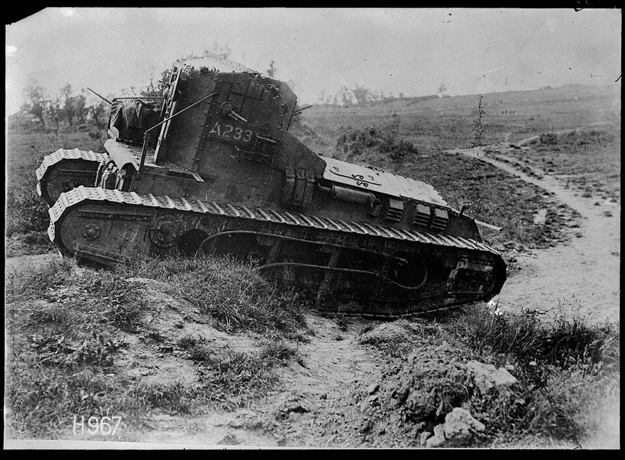 A close view of a Whippet tank crossing a trench near Grevillers, France, during World War I.